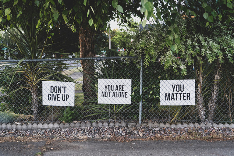 Don't give up You Matter and You are not alone signs